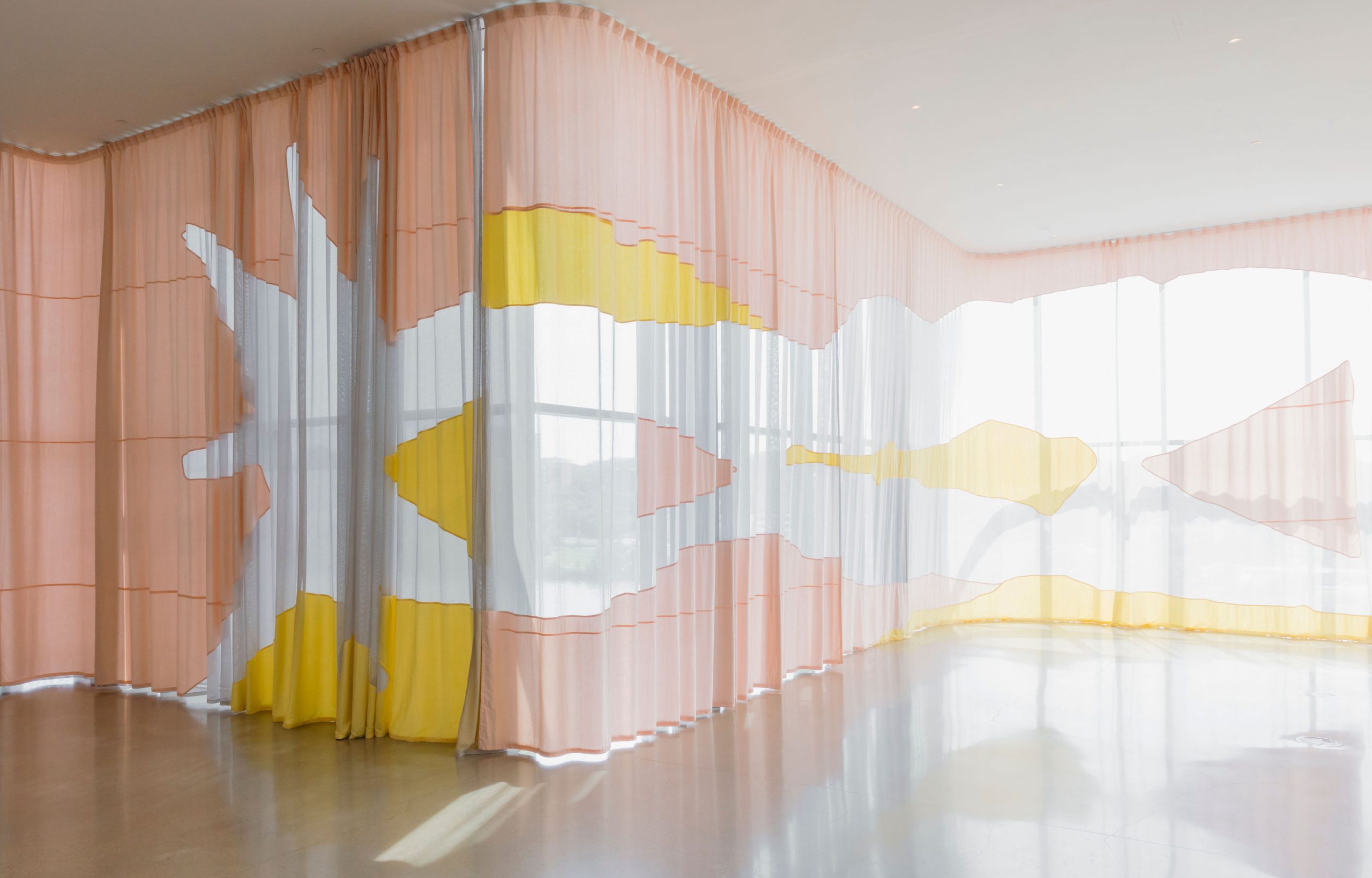 Installation view of a large textile piece by artist Celine Condorelli
