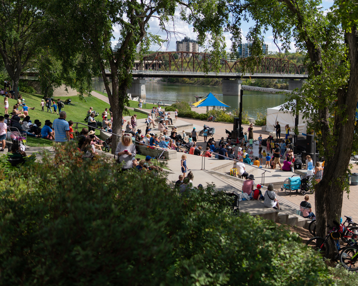 People gather outside at the River Landing amphitheatre for WEGO.