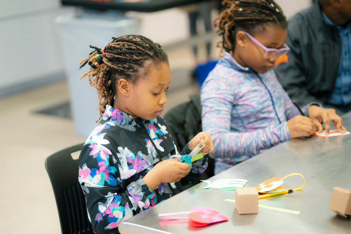 Students work on art projects in the learning studio at Remai Modern