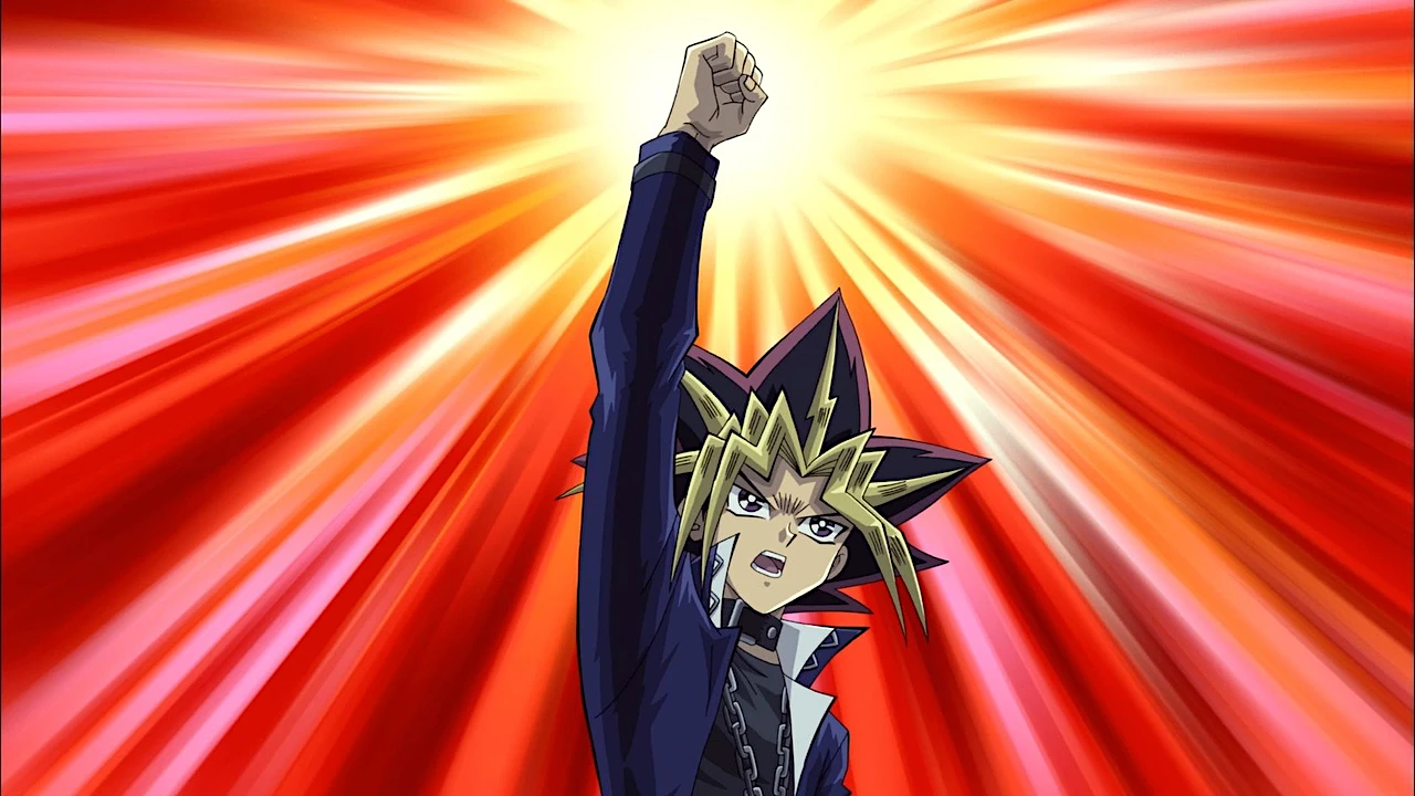 An anime character with dramatic spiky black and gold hair thrusts a fist triumphantly into the air against a blazing red and yellow radial burst background. The character wears a dark jacket with a white collar and has an intense, determined expression, depicted in a classic early 2000s anime style.